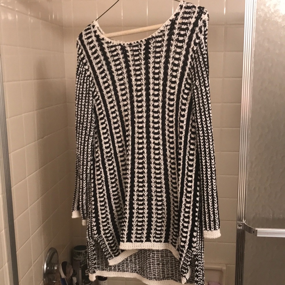 This sweater was worn once and got lost in my closet. In great condition